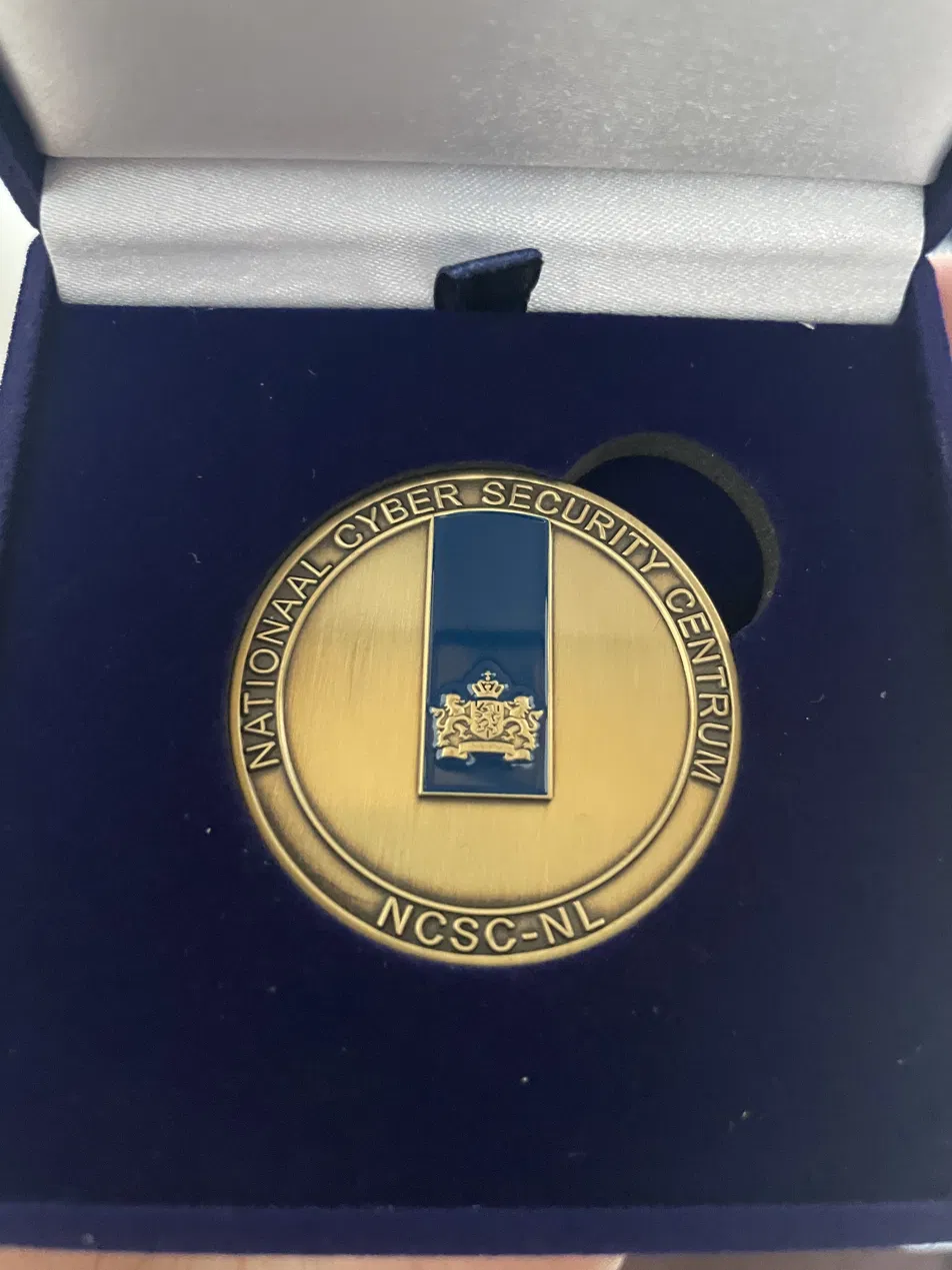NCSC-NL challenge coin in a presentation box